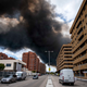 Black smoke rises in the sky over the housing area ‘El Quinon’ in Toledo, Spain.